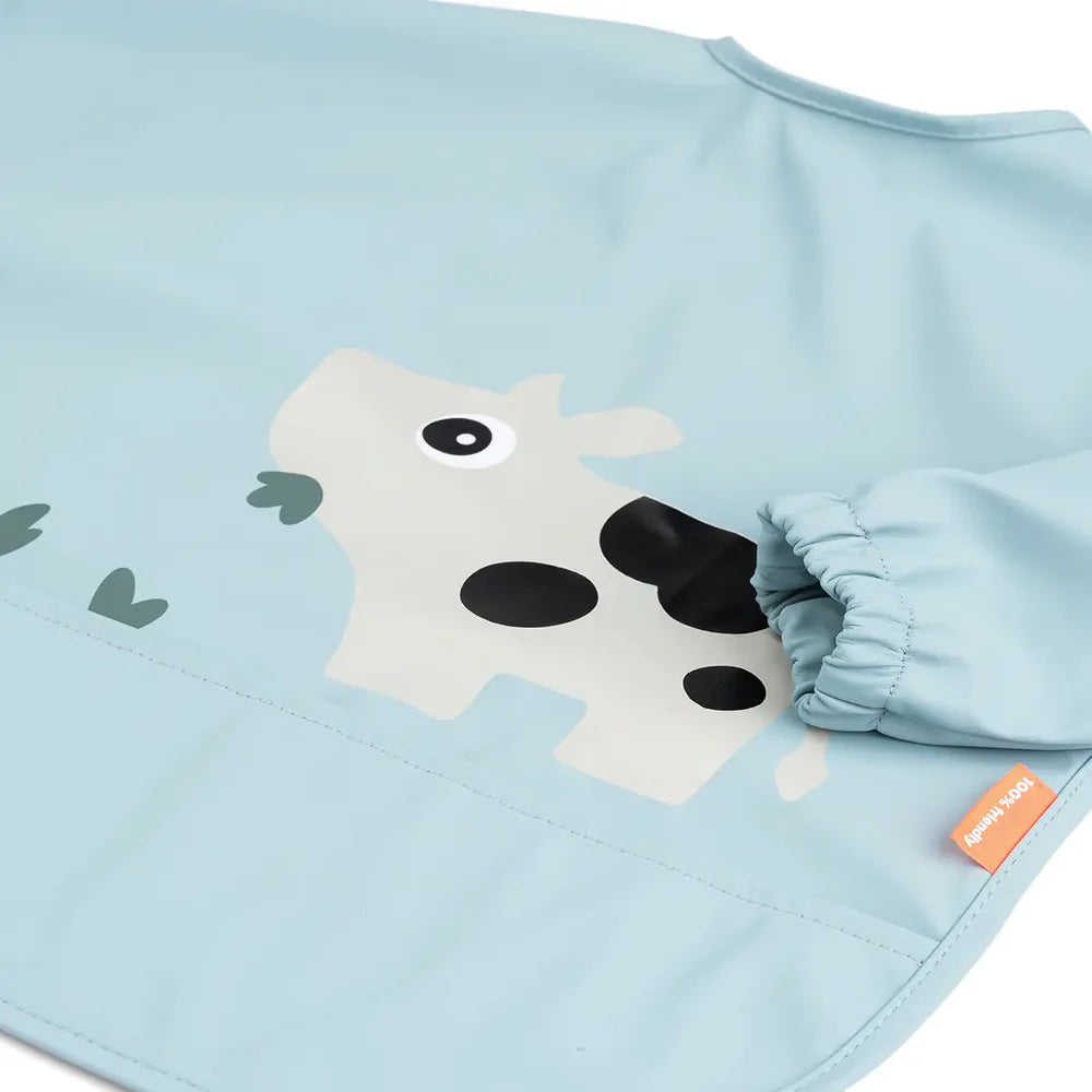 Babero con mangas - Vaca azul